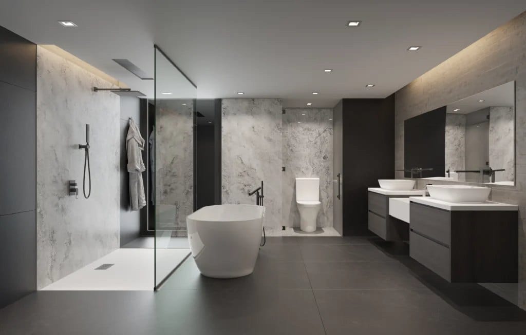 Haven Custom full modern bathroom build — a wide marble-look walk-in shower with frameless glass and designer fixtures, a freestanding soaking tub, a double-sink vanity with vessel sinks and a wide mirror, recessed lighting, and warm-gray Tundra composite wall panels tying the whole space together.